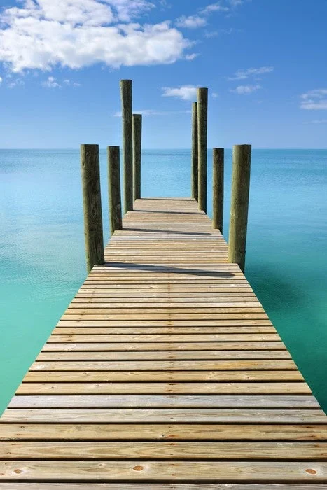 Turquoise blue sea wharf
